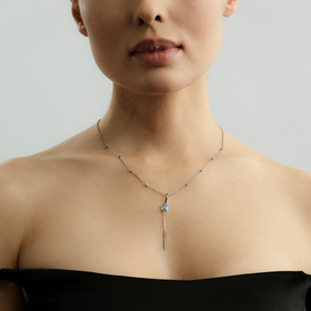 колье из белого золота с топазом и бриллиантами nightshade